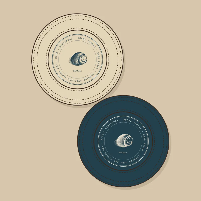 Two bucket hats seen from above, a shell in each crown