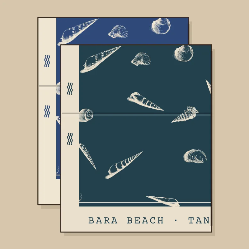 Two folded pareos in the Lemari Laut shell repeat, night teal and indigo, with the place names along the edge